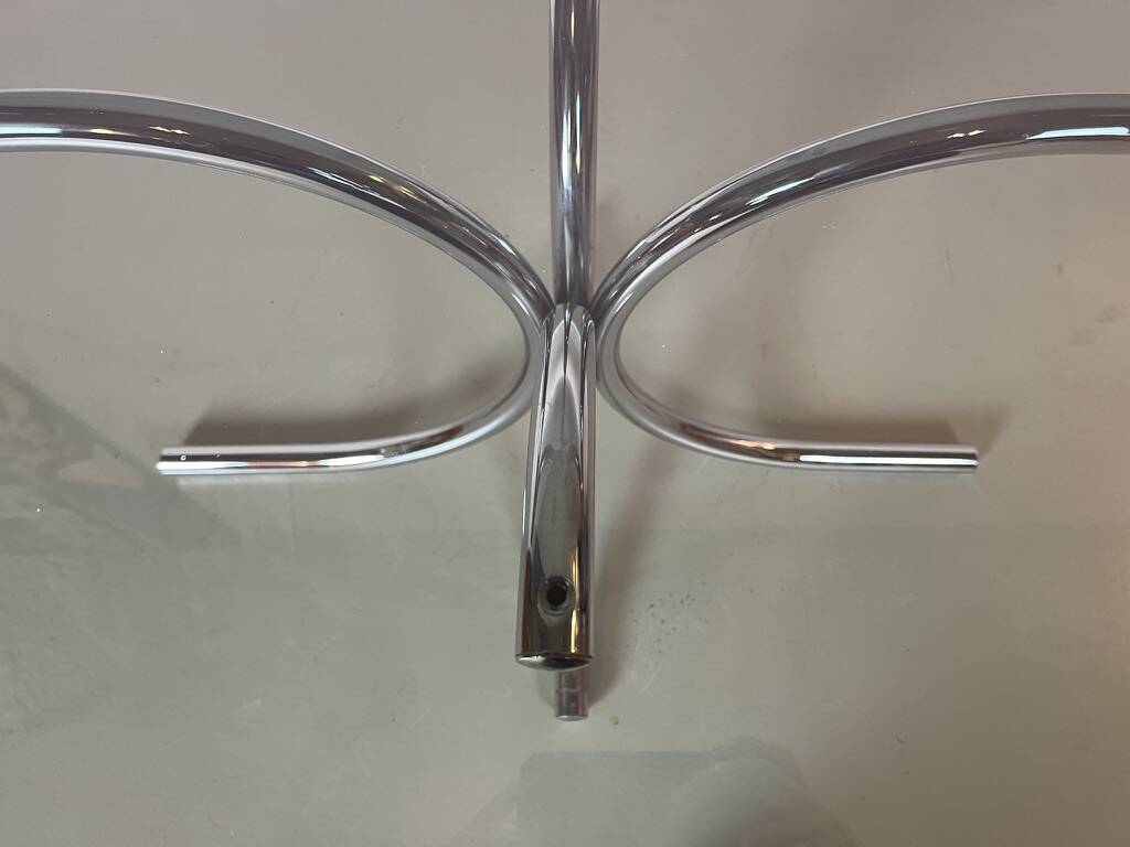 Vintage coffee table from the 70s in smoked glass and chrome, oval, Space Age style.