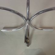 Vintage coffee table from the 70s in smoked glass and chrome, oval, Space Age style.