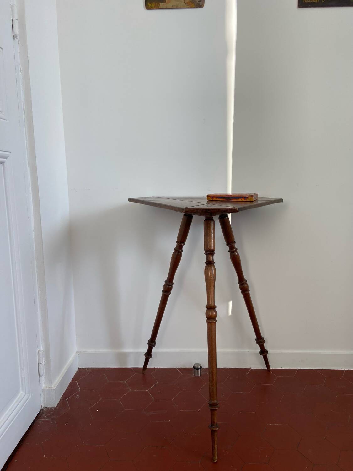 Old tripod side table