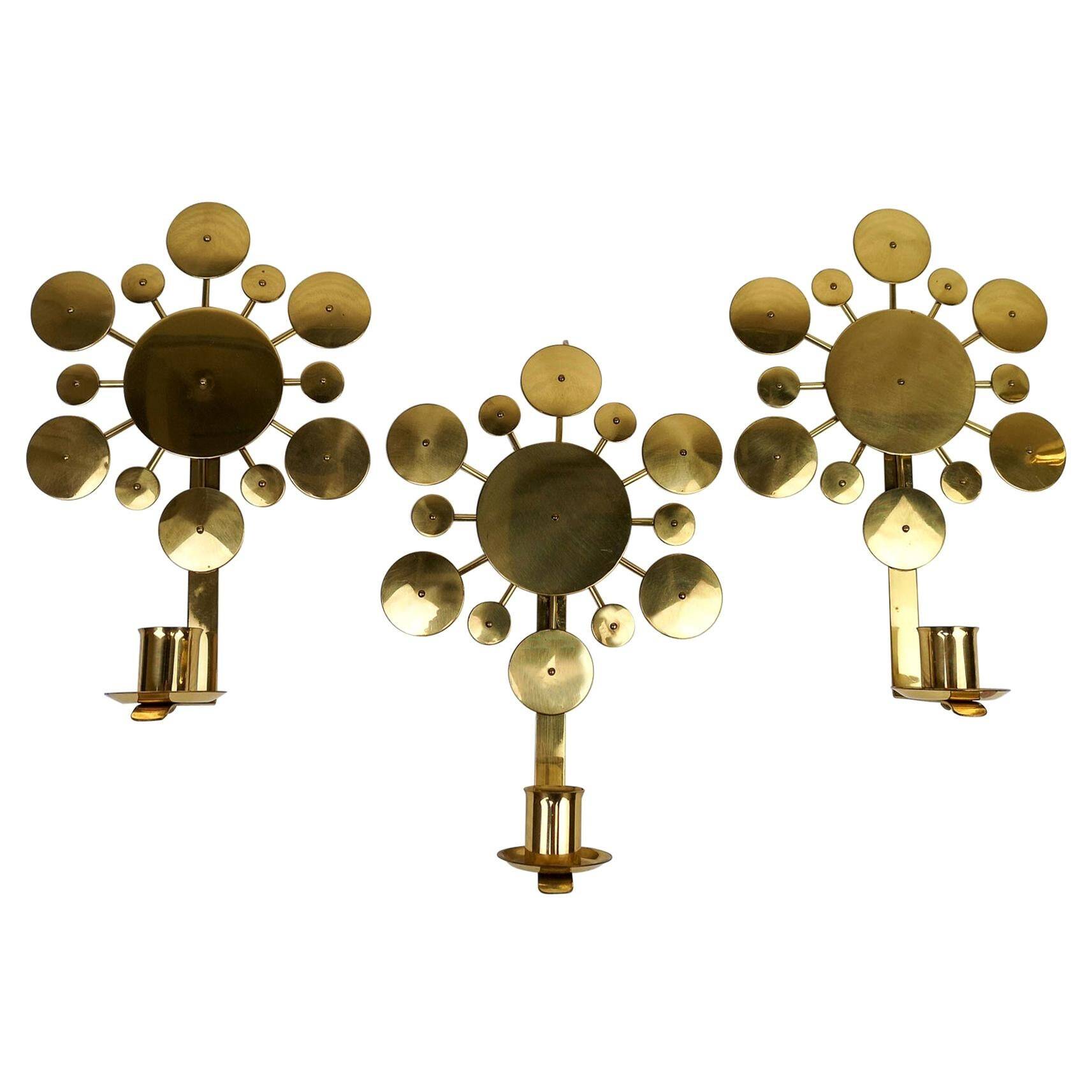 Set of 3 Wall Candle Holders in Brass "Sunburst" Holmström, Arvika, Sweden, 1960s
