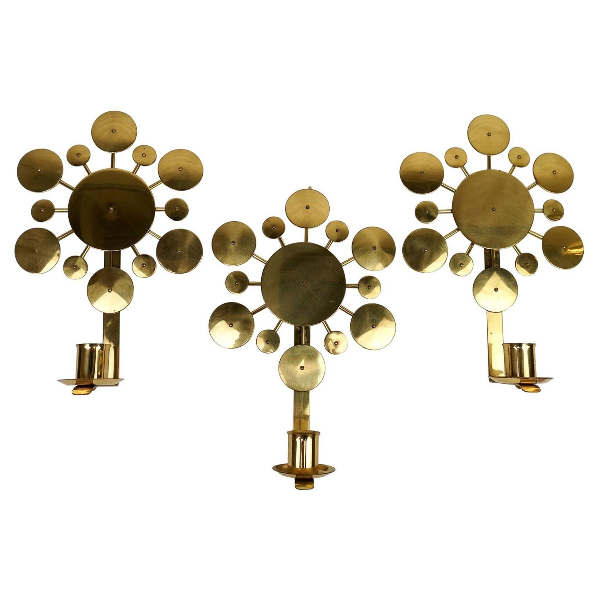 Set of 3 Wall Candle Holders in Brass "Sunburst" Holmström, Arvika, Sweden, 1960s
