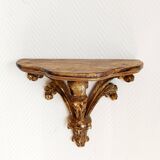 Golden wood wall console in Louis XV style.