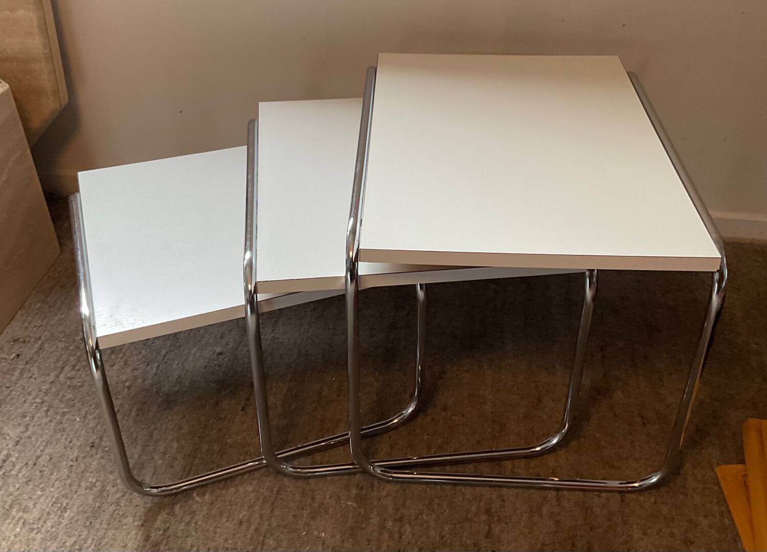 Trio of vintage nesting tables in Formica and chrome metal