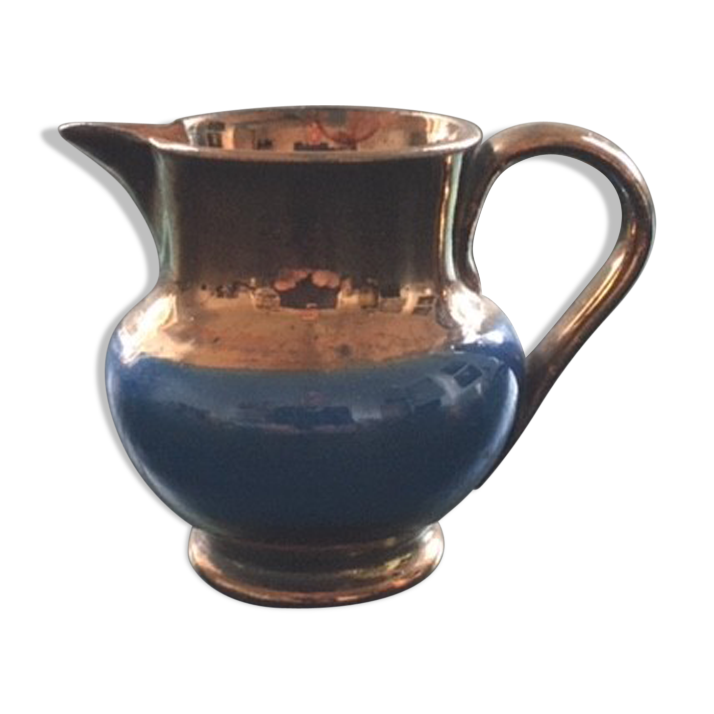 Two-tone copper and blue pitcher