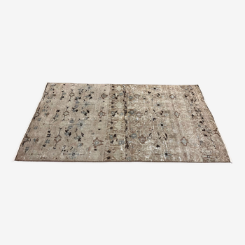 Unique aztec design muted handmade old rug