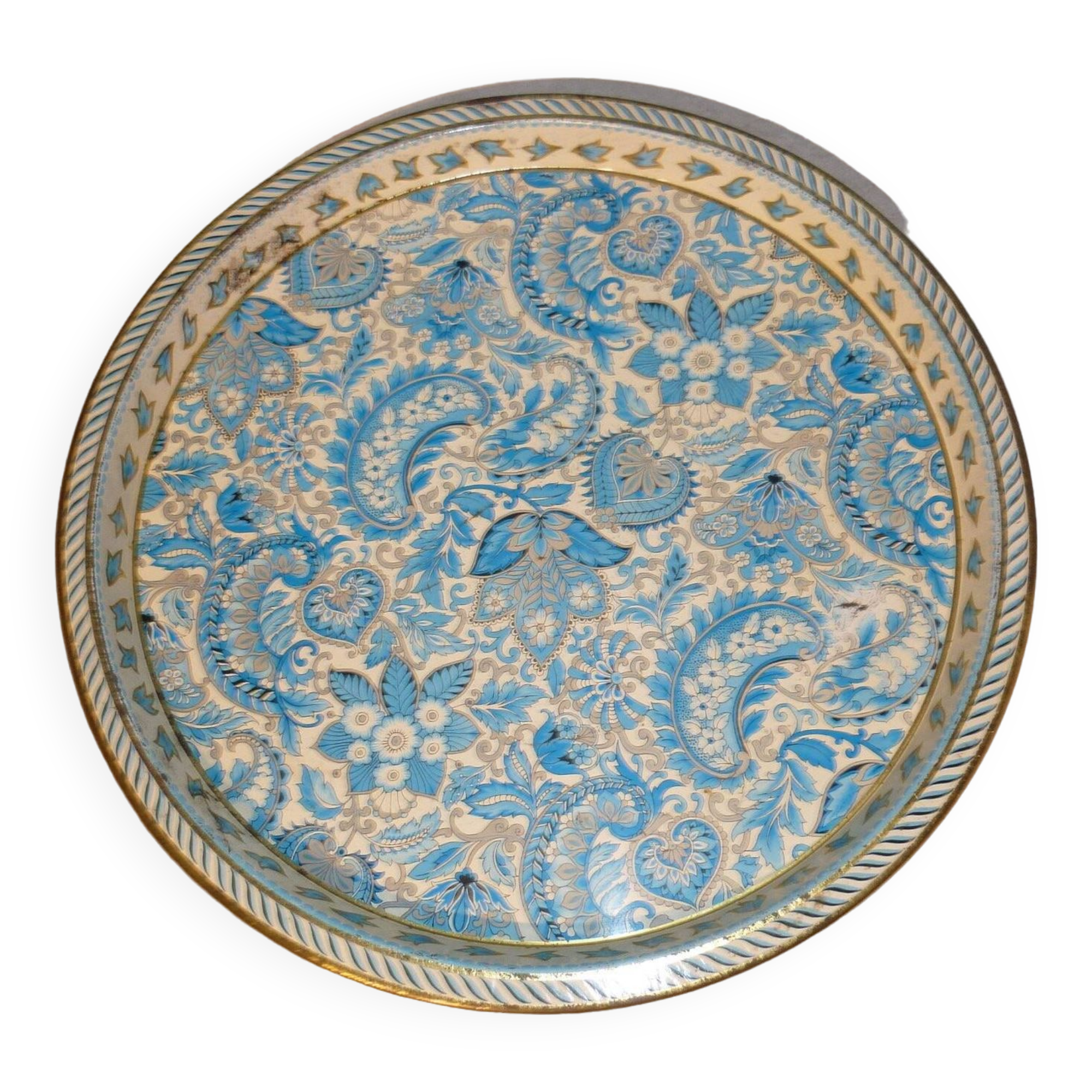 Blue cashmere round tray on white background.