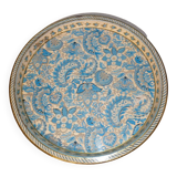 Blue cashmere round tray on white background.