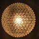 Vintage wall lamp from the 70s in molded glass