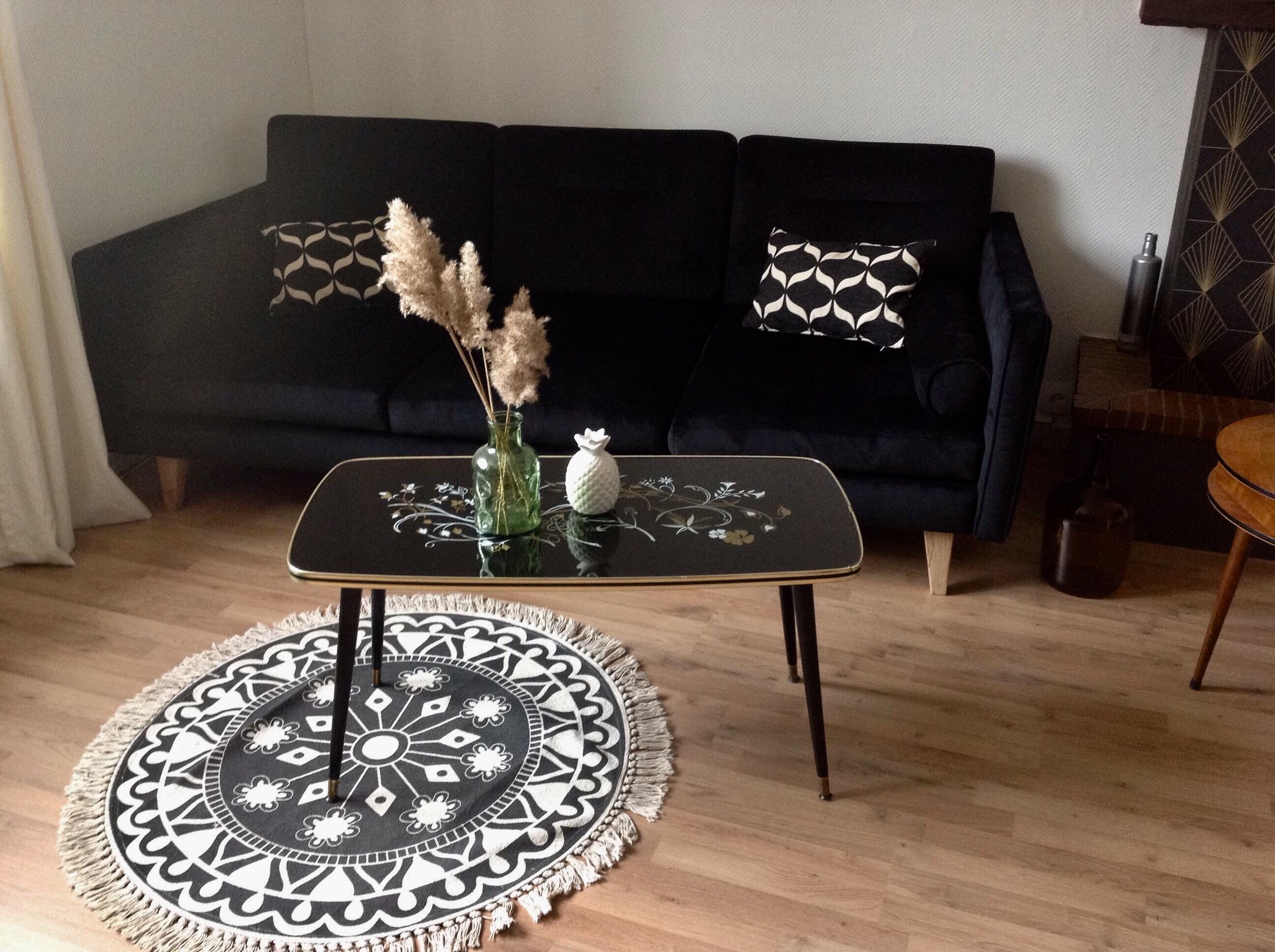 Coffee table, year 60, black with floral patterns