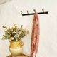 Wall-mounted coat rack with 4 hooks in metal and brass