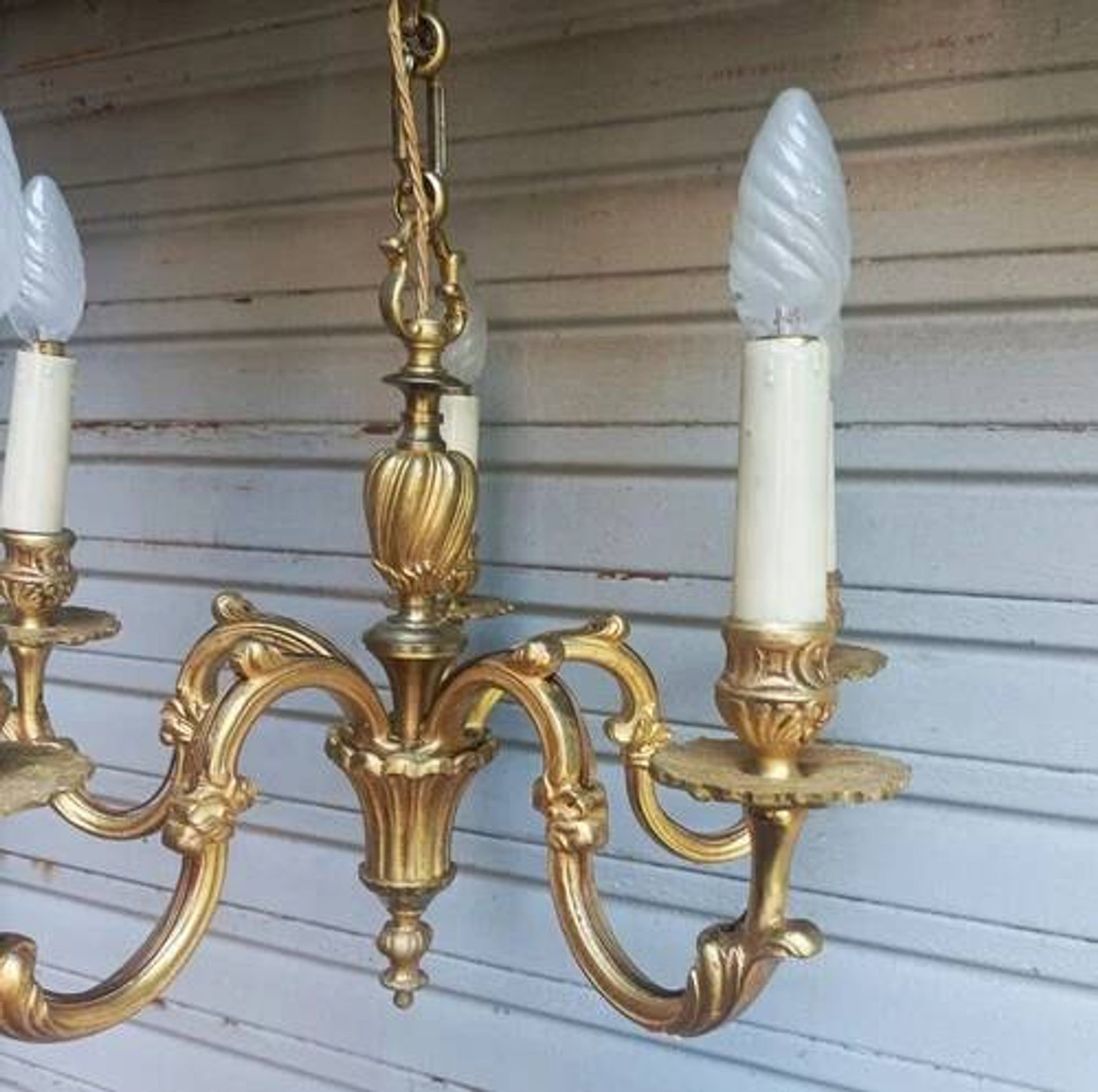 Antique gilded bronze chandelier in Louis XVI style, 5 lights, in working condition.