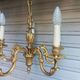 Antique gilded bronze chandelier in Louis XVI style, 5 lights, in working condition.