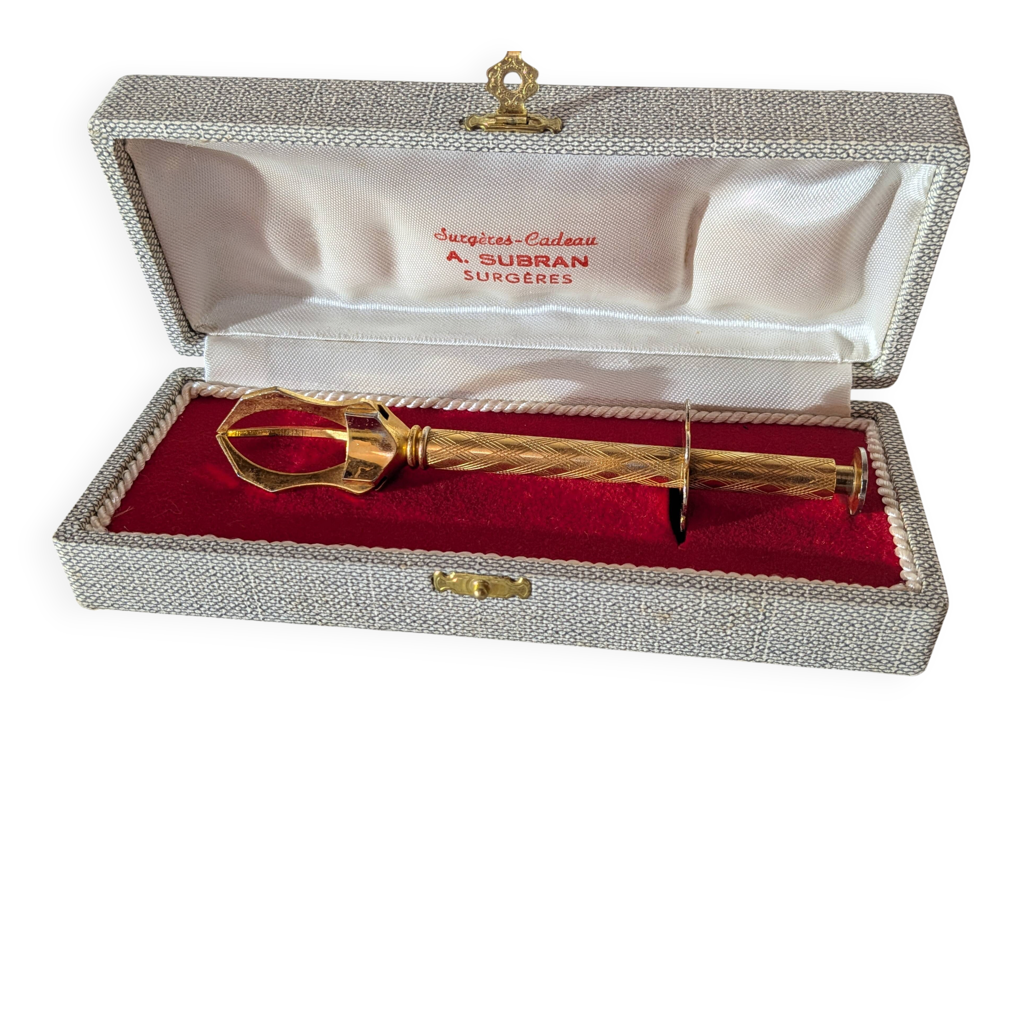 Vintage gold sugar tongs with case