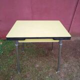 Yellow formica table with extensions