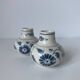 Pair of miniature blue and white Vietnamese ceramic vases with floral decoration.