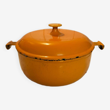 Cast iron casserole dish Creuset light orange
