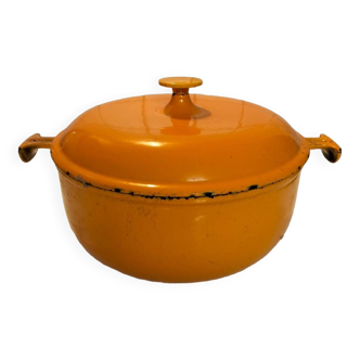 Cast iron casserole dish Creuset light orange