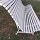 Old garden bench with metal legs and wooden slats