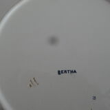 Plat rond en faïence motif Bertha