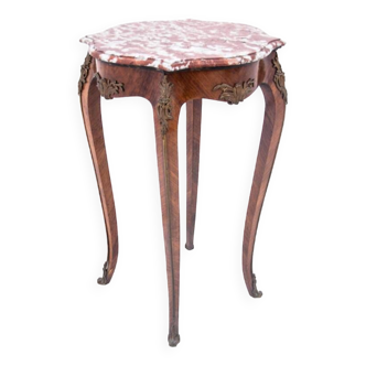 Table with a marble top, France, around 1910.