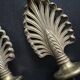 Pair of bronze curtain rod finials in the Napoléon III style with a palmette design.