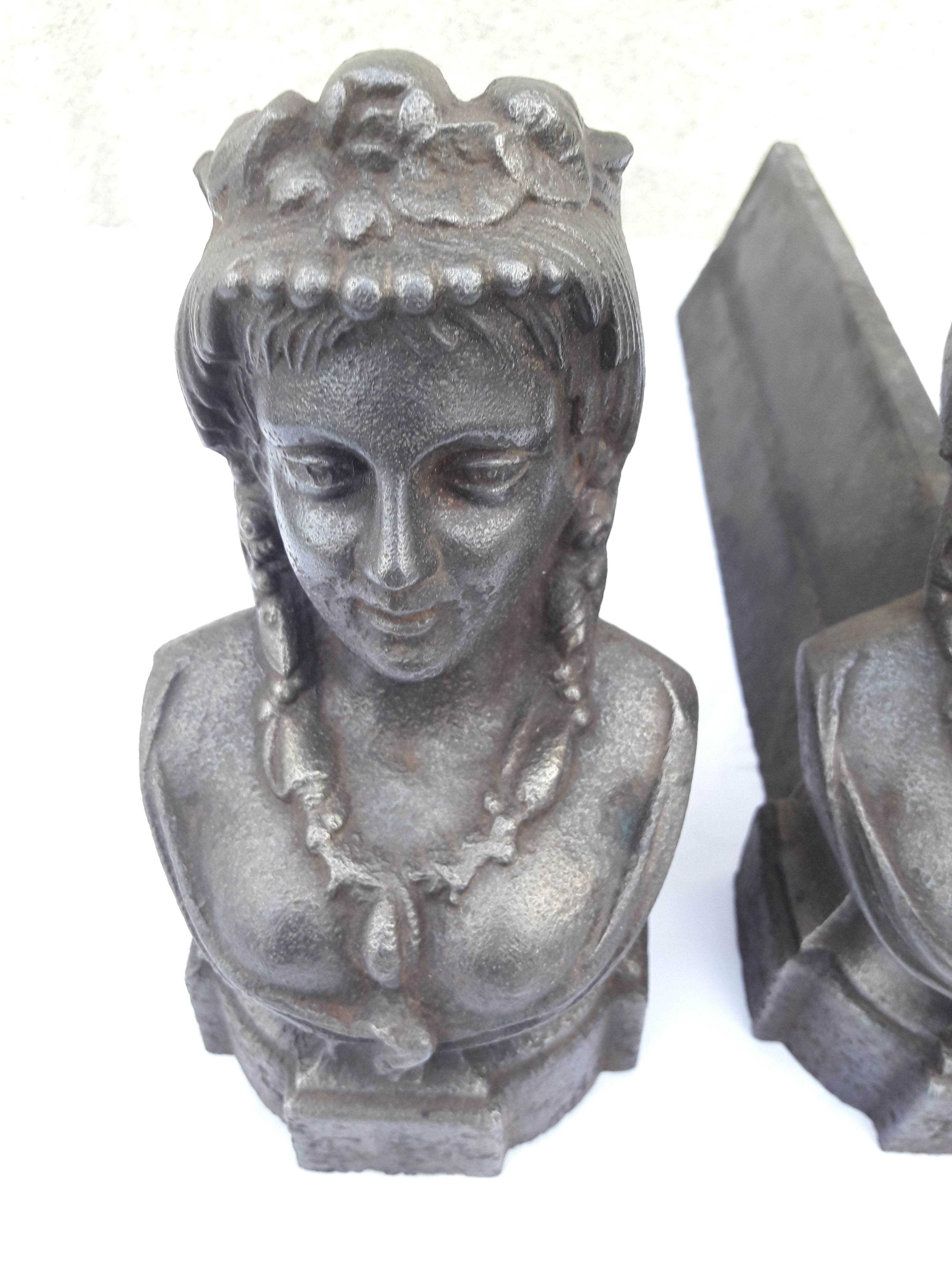 Pair of cast iron channels and metal FAU woman's head