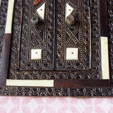 Vintage Moroccan mirror with chiseled pewter shutters