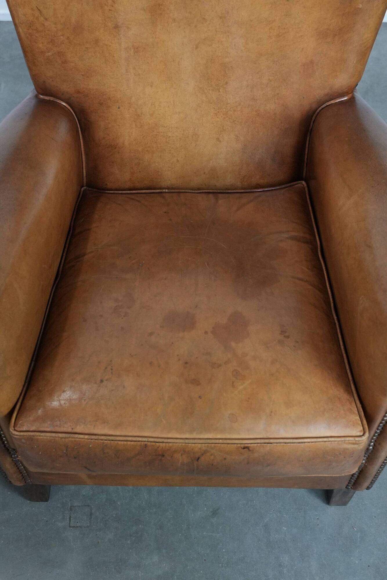Set of two vintage sheepskin armchairs with beautiful and warm colours