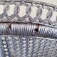 Fauteuil vintage emmanuelle en rotin tressé argent