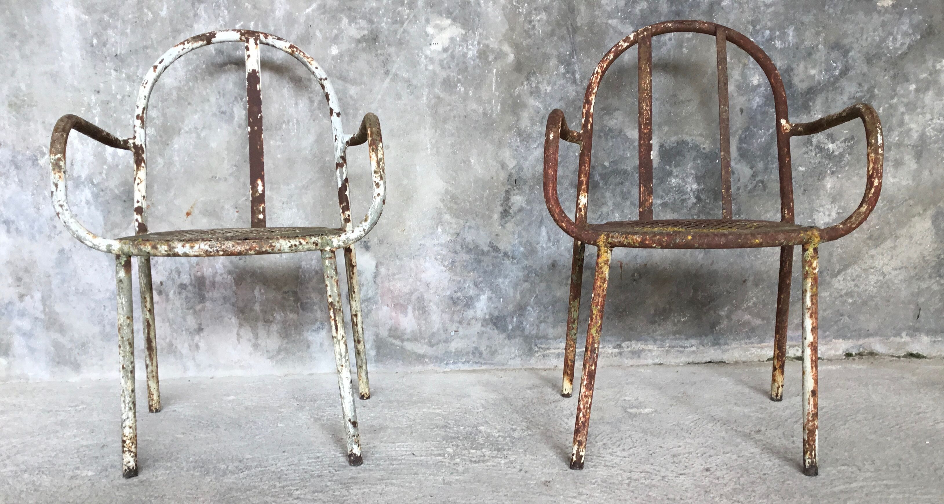 Pair of metal armchairs