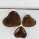 Set of 3 Scandinavian teak empty pockets in heart shape.