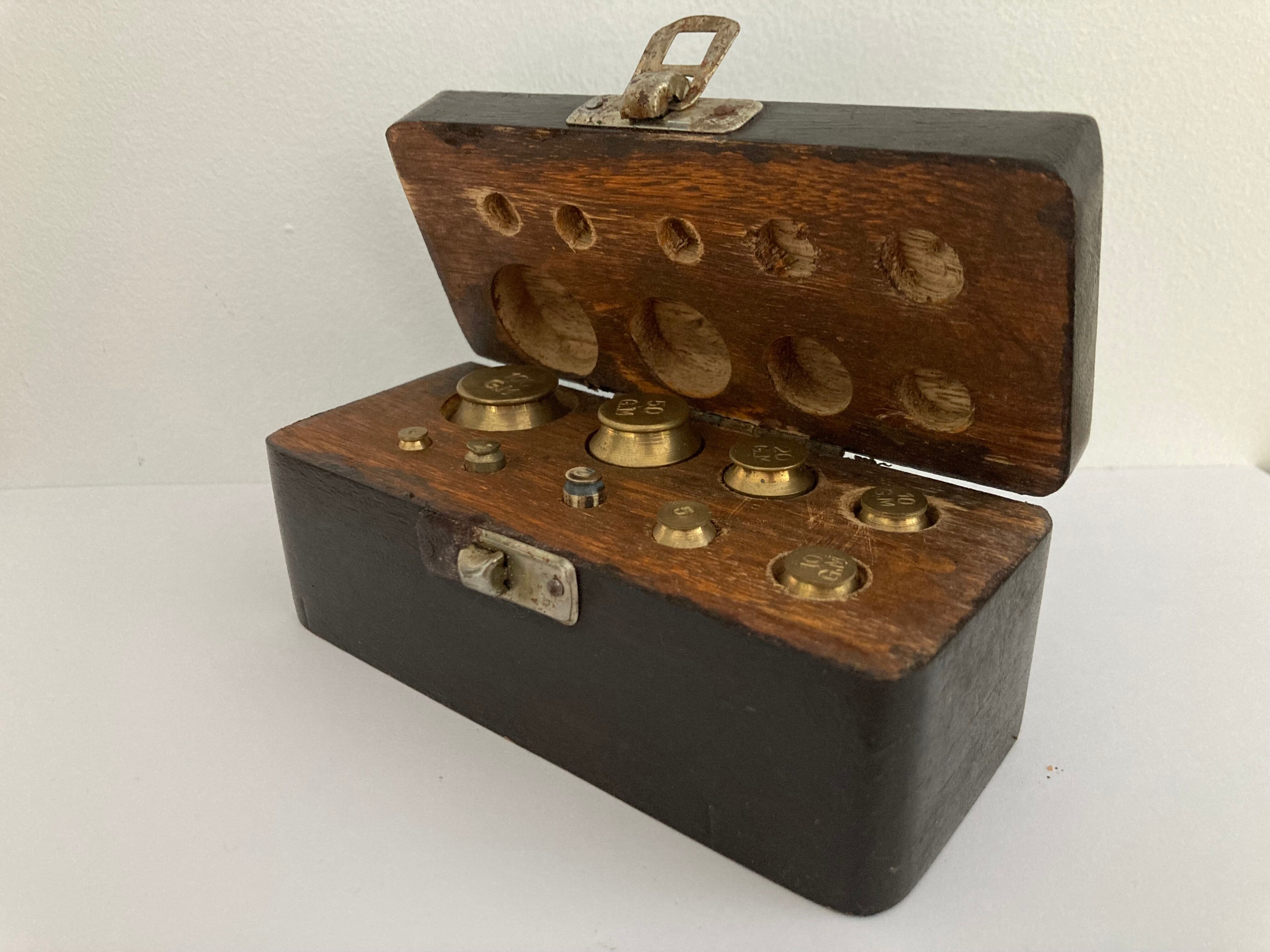 Balance weight in their wooden box