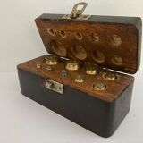 Balance weight in their wooden box