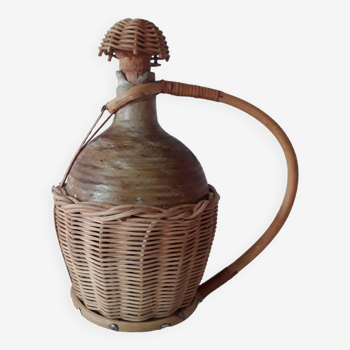 Old stoneware and rattan jug