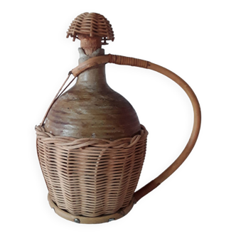 Old stoneware and rattan jug