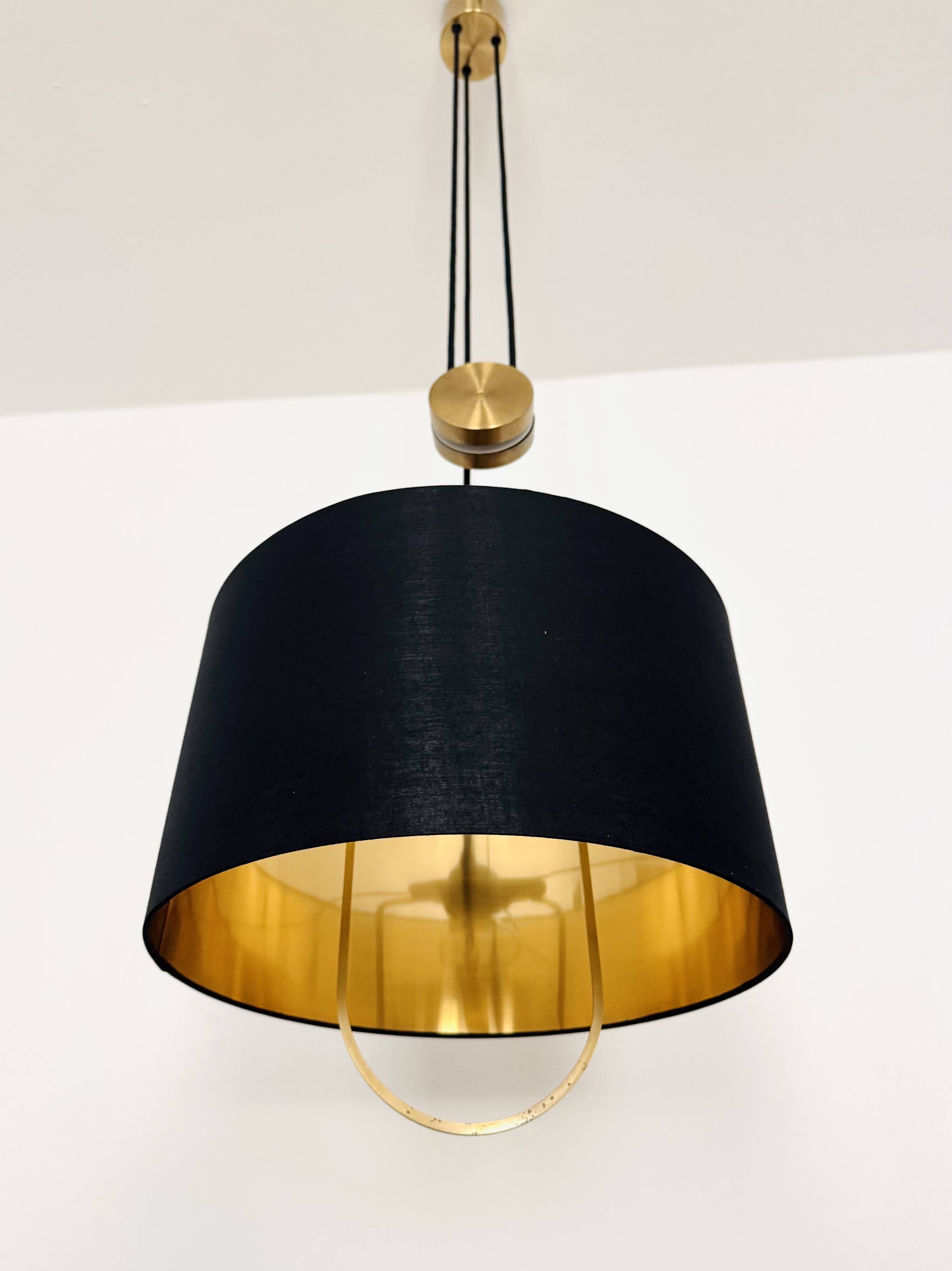 Lampe à pendentif Jo-Jo réglable par Florian Schulz