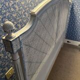 White wooden cane bed