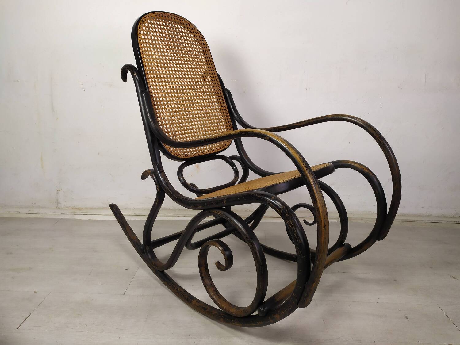Black curved wood rocking chair