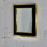 Jean-Claude Mahey mirror. Black lacquered wood and gold metal. 1970