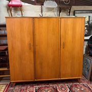 Vintage 60s/70s design wardrobe with compass feet.