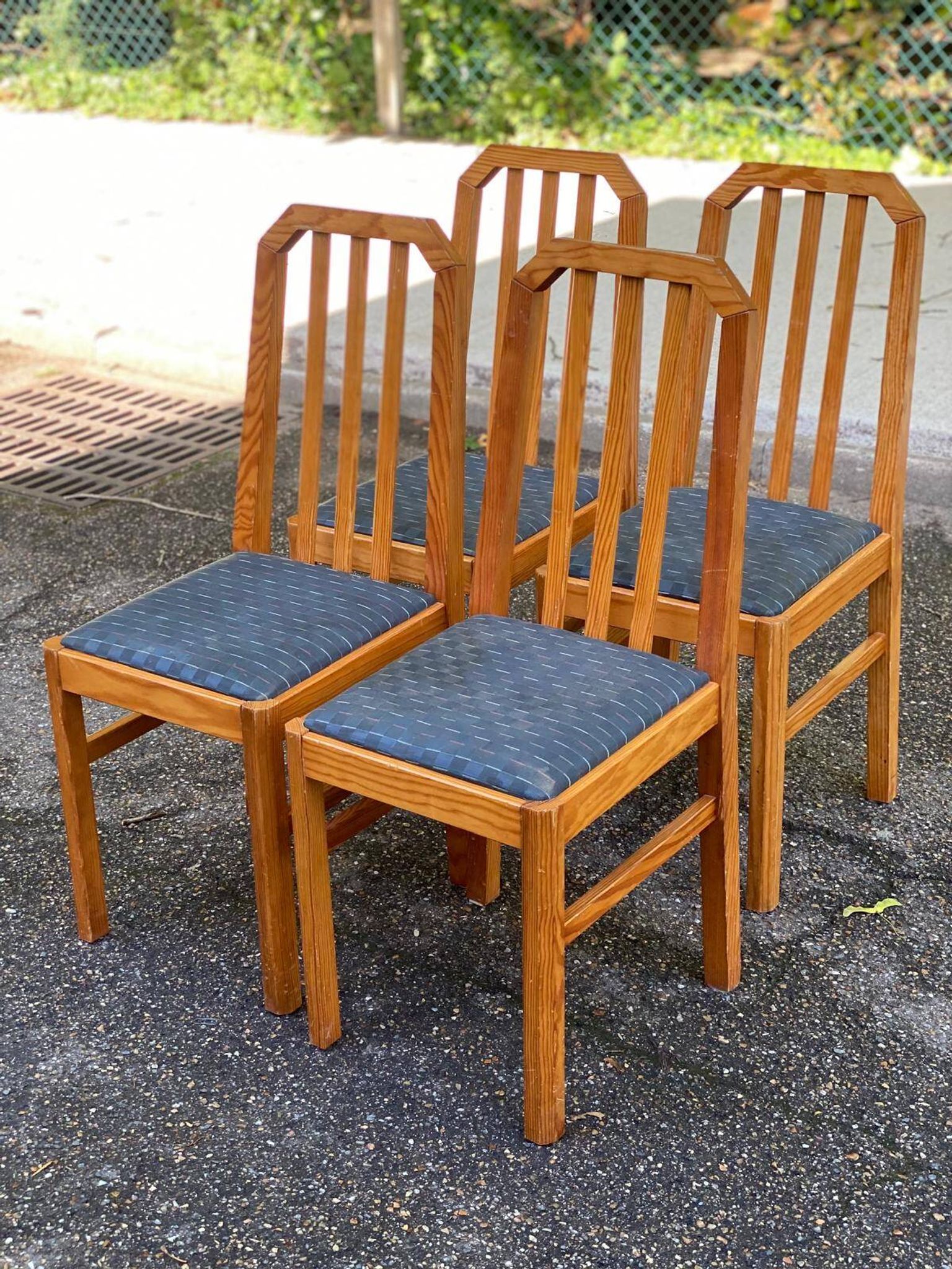4 solid wood and blue fabric dining chairs with bars