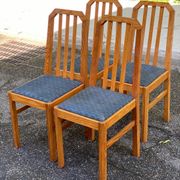 4 solid wood and blue fabric dining chairs with bars