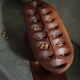 Decorative Mancala game board made of hand-carved wood, Africa, mid-20th century.