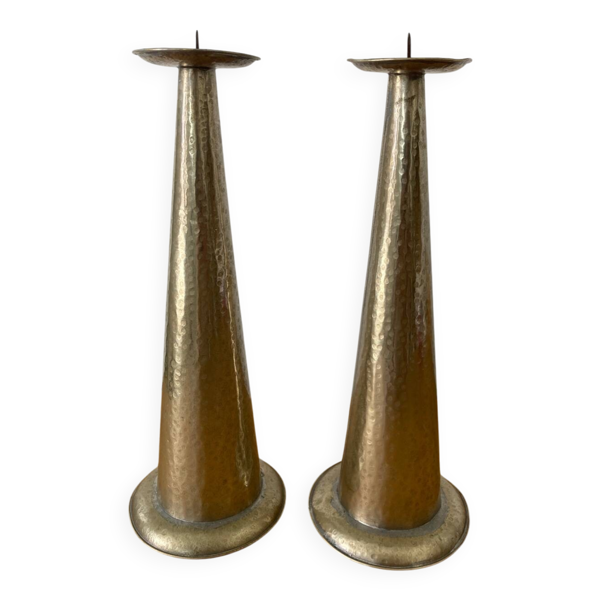 Pair of hammered metal candlesticks