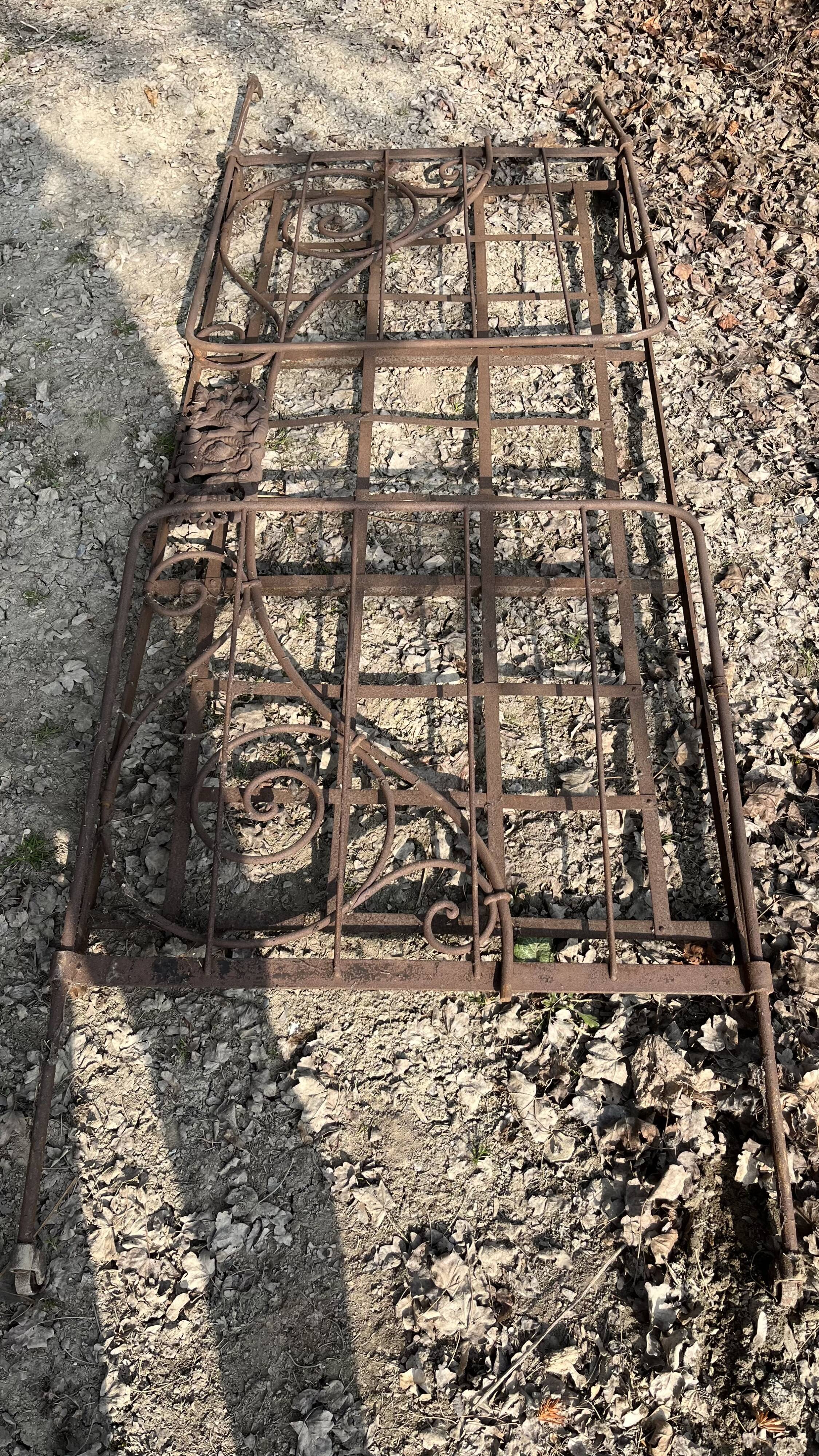 Folding wrought iron bed 1900