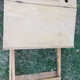 Children's desk with crossed legs