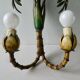 Pair of bamboo and palm sconces in metal