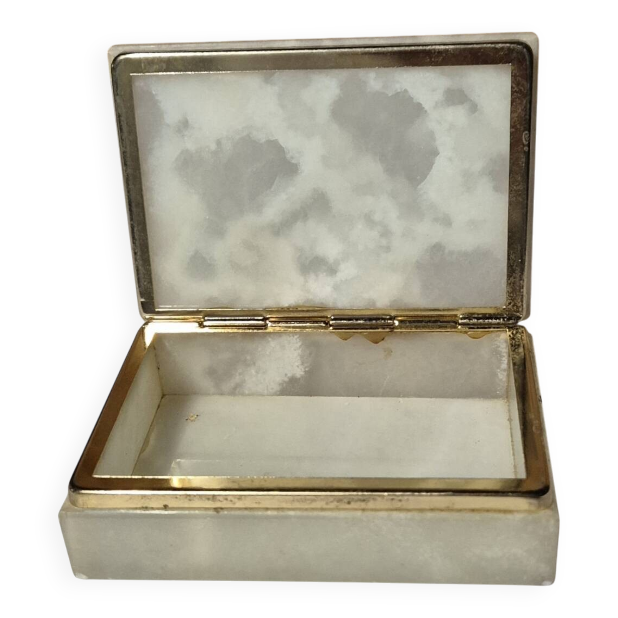 Rectangular light onyx jewellery box with brass trim, empty.