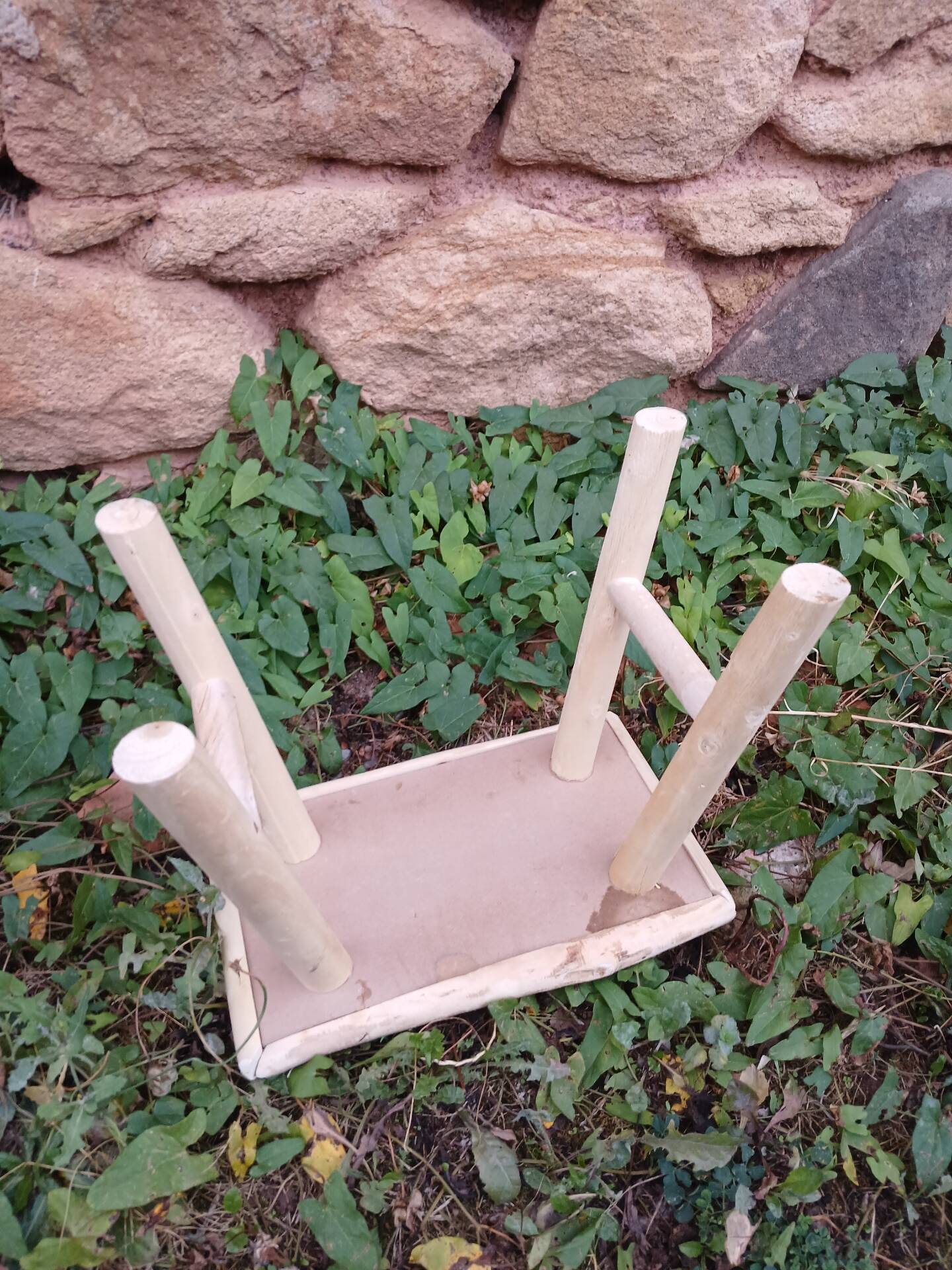 Small stool in raw wood