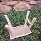 Small stool in raw wood